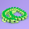 Beweglicher Flexi-Drache mit blattartigen Elementen entlang des Rückens, PrintHero