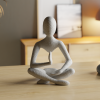 Minimalistische Meditationsfigur in Sitzhaltung, PrintHero