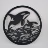 2D-Wandbild mit einer Orca-Familie im Ozean, rundes Design, PrintHero