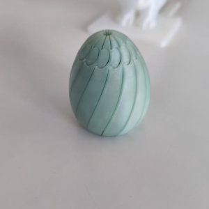 Eiförmiges Fidget-Spielzeug mit segmentierter Oberfläche, PrintHero